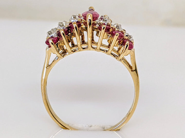 14K RUBY MARQUISE 3.5X7 WITH (12) ROUND AND (4) DIAMOND MELEE ESTATE RING 3.2 GRAMS