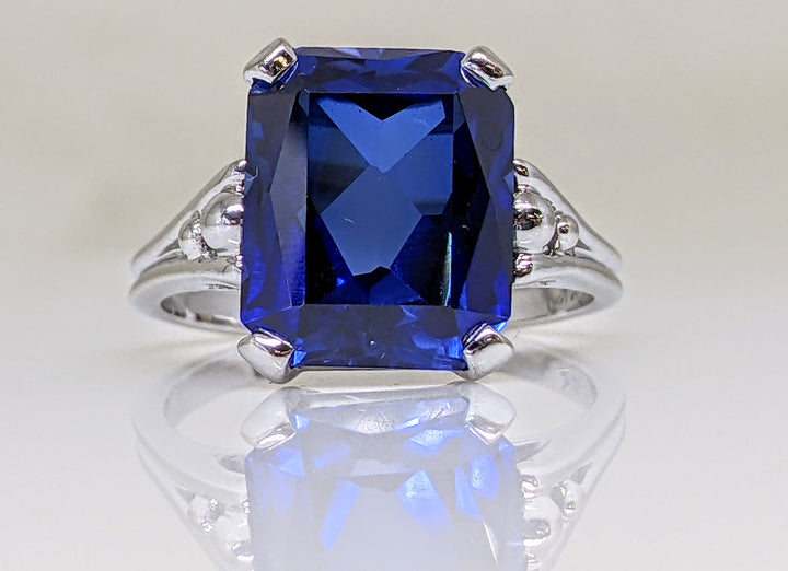 14kW SYNTHETIC SAPPHIRE EMERALD CUT 10X12 ESTATE RING 5.3 GRAMS