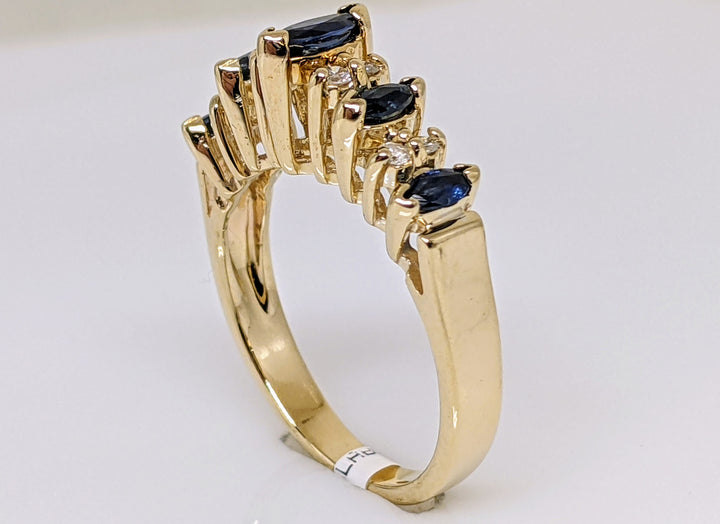 14k SAPPHIRE MARQUISE 2.5X4 (1) 2X4 (4) WITH .16 DIAMOND TOTAL WEIGHT (8) ROUND ESTATE RING 3.0 GRAMS