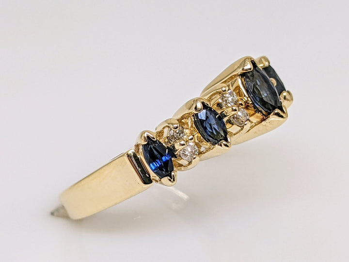14k SAPPHIRE MARQUISE 2.5X4 (1) 2X4 (4) WITH .16 DIAMOND TOTAL WEIGHT (8) ROUND ESTATE RING 3.0 GRAMS