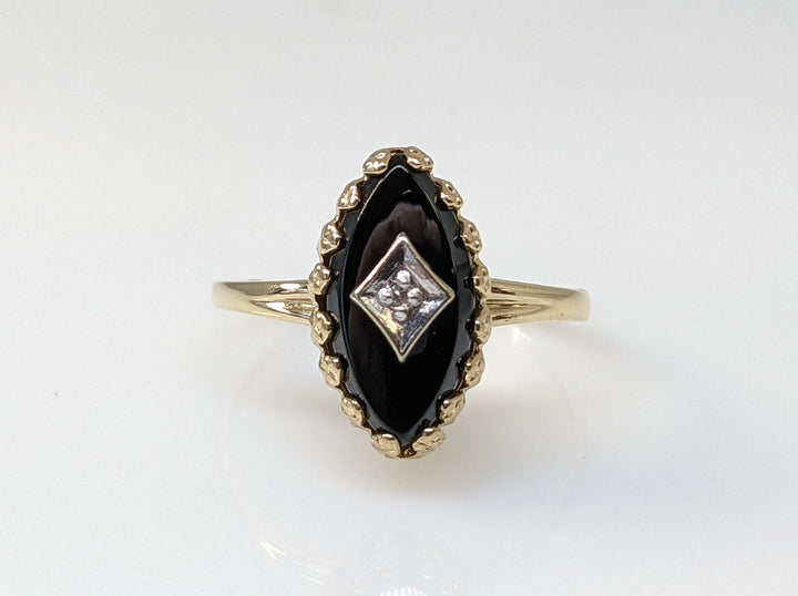 10K ONYX MARQUISE 6X12 WITH MELEE ESRTATE RING 1.4 GRAMS