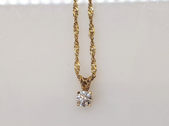14k .50 CARAT TOTAL WEIGHT I1 I DIAMOND ROUND ESTATE PENDANT AND CHAIN 3.2 GRAMS