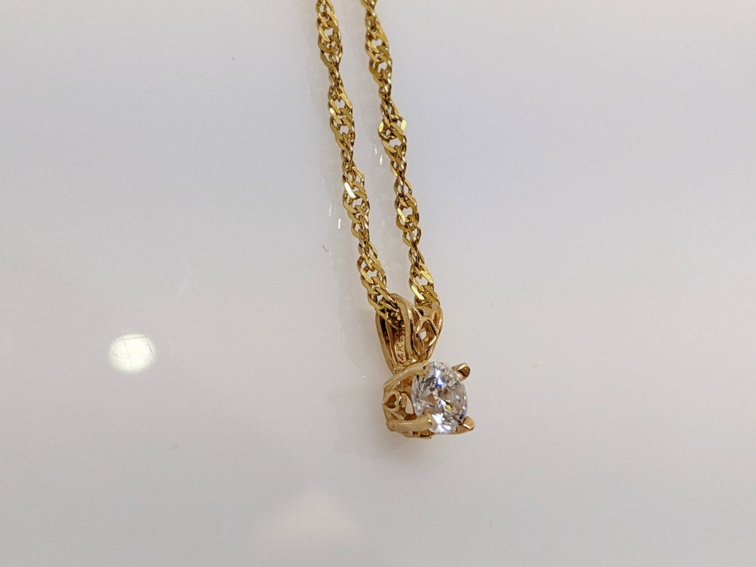 14k .50 CARAT TOTAL WEIGHT I1 I DIAMOND ROUND ESTATE PENDANT AND CHAIN 3.2 GRAMS