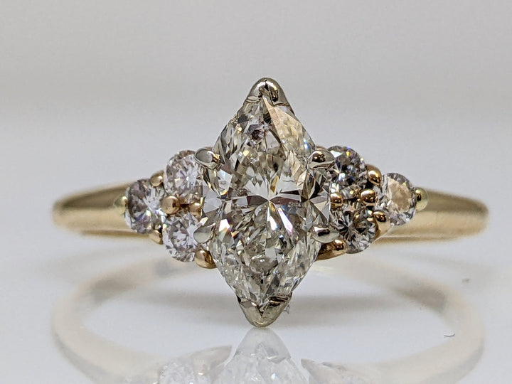 14K 1.36 CARAT TOTAL WEIGHT I1 K DIAMOND MARQUISE WITH (6) ROUND MELEE 3.0 GRAMS